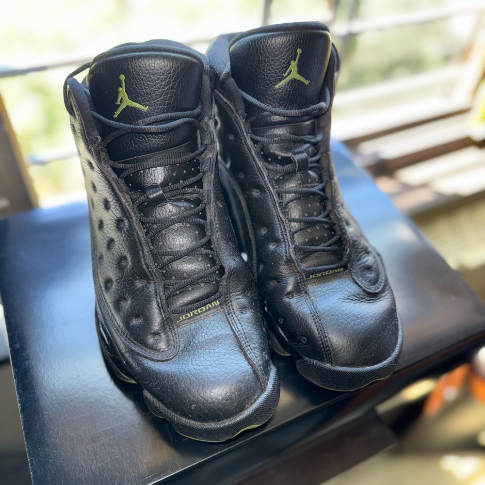 Air Jordan Black Sneakers with Green Accents